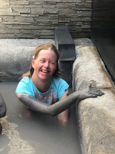 Wendy in hot mud bath at Hells Gate Rotorua NZ